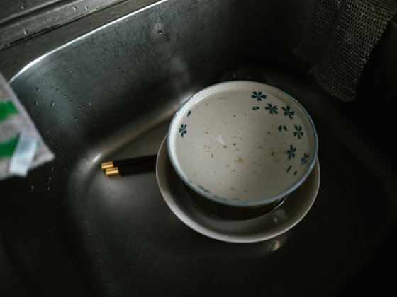 Worst store: A stainless steel sink with dirty dishes left in it