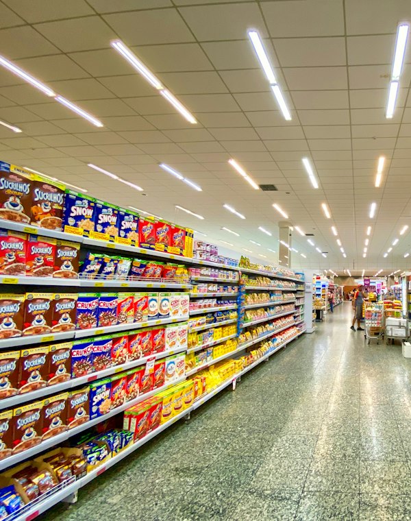 Downtown, the best store: every shelf full and faced, aisle clear and bright